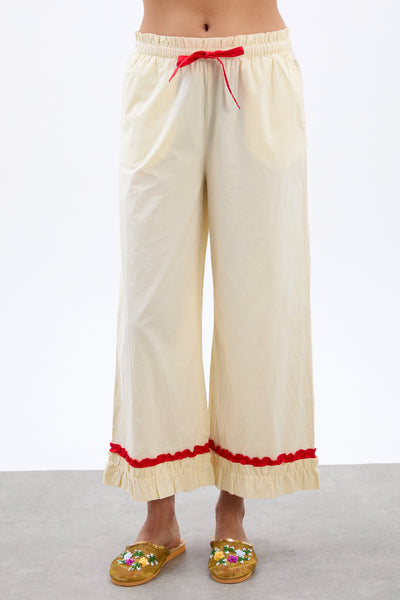 tula frilly hem trouser - butter/red