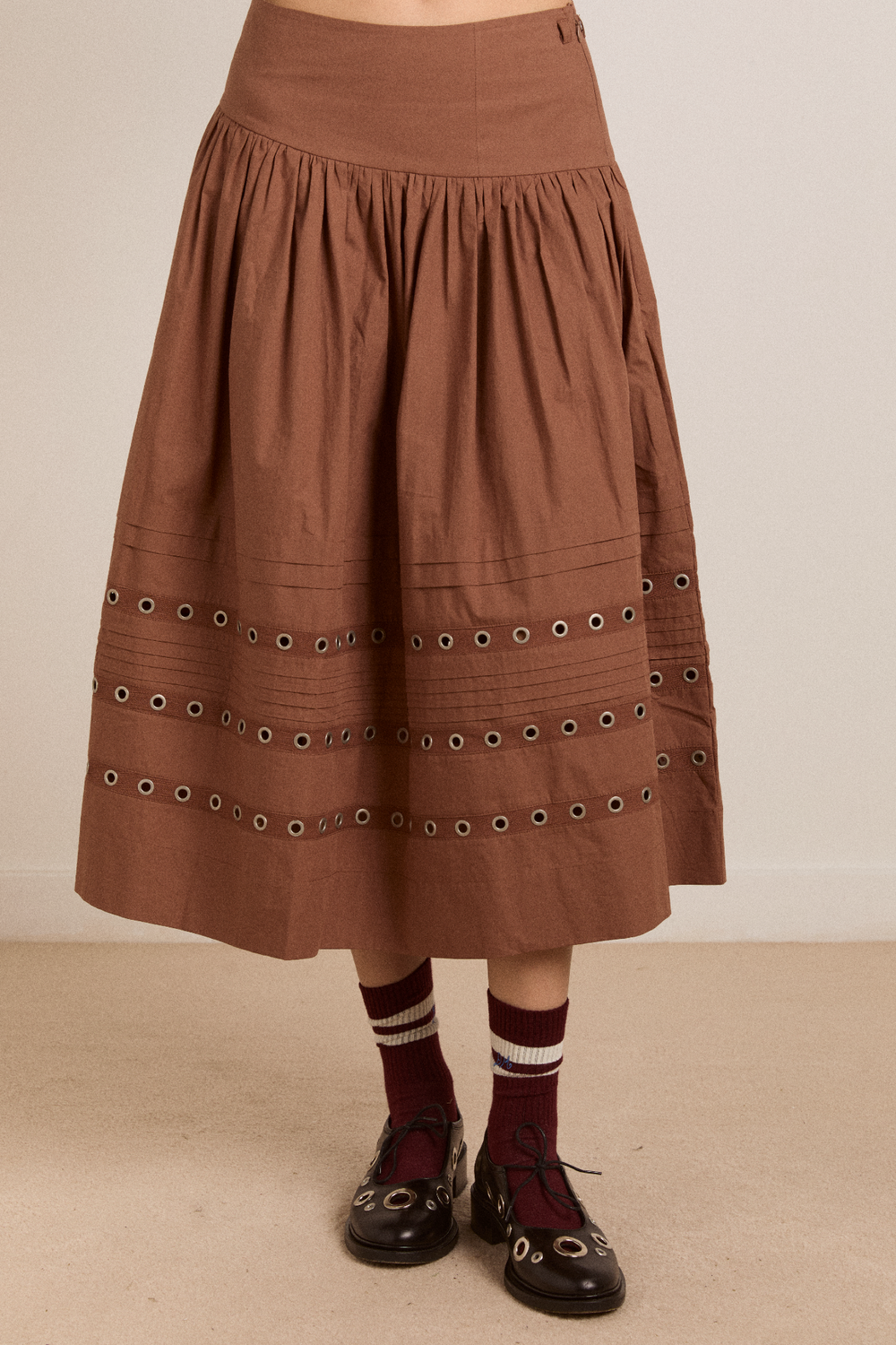anika eyelet skirt with ruffle belt- tan