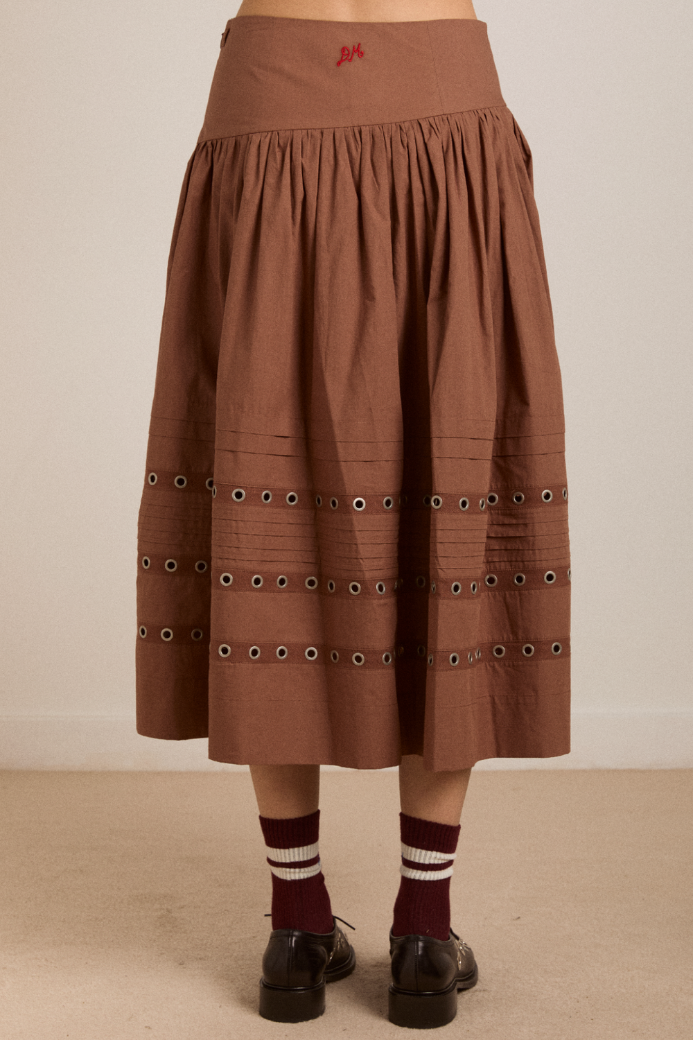 anika eyelet skirt with ruffle belt- tan