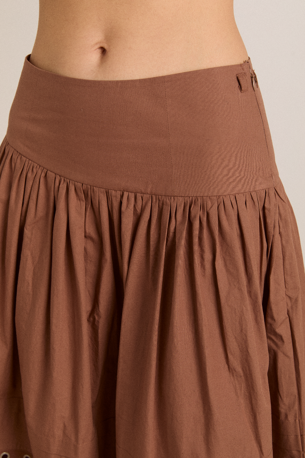 anika eyelet skirt with ruffle belt- tan