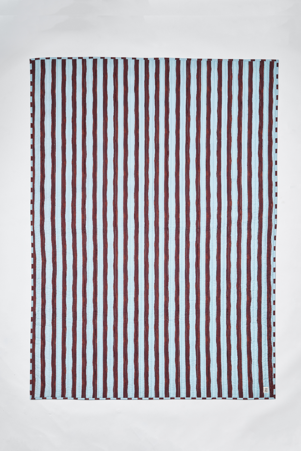 patchwork print and stripe mix quilted bedding throw