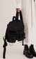 frill backpack in black floral stitch