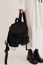 frill backpack in black floral stitch