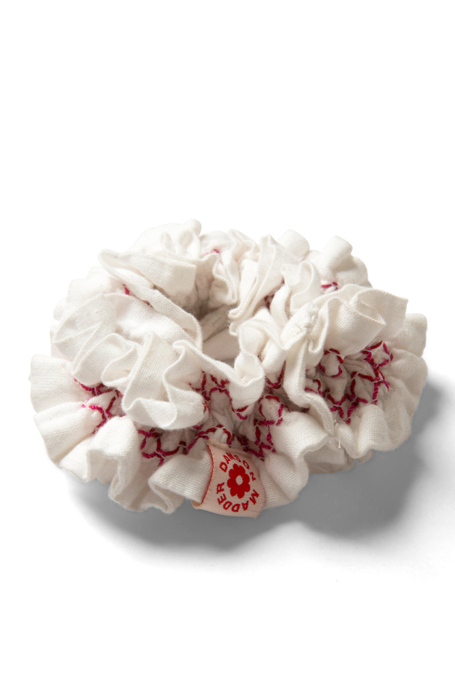 garter scrunchie in white with red stitch detail