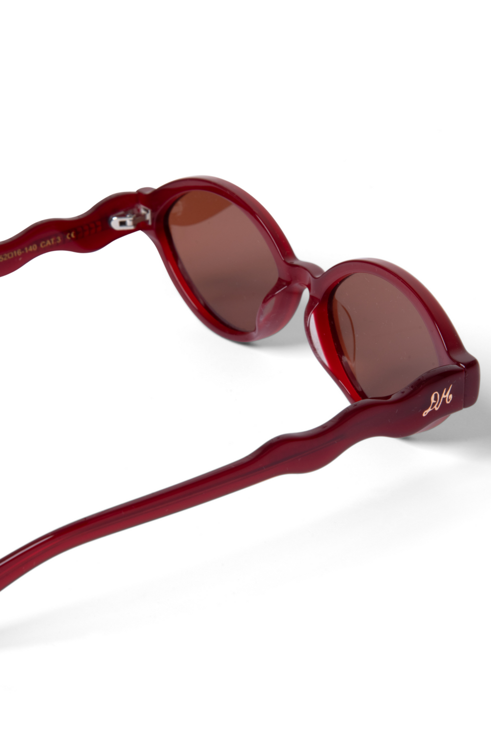 wavey temple sunglasses - crystal red
