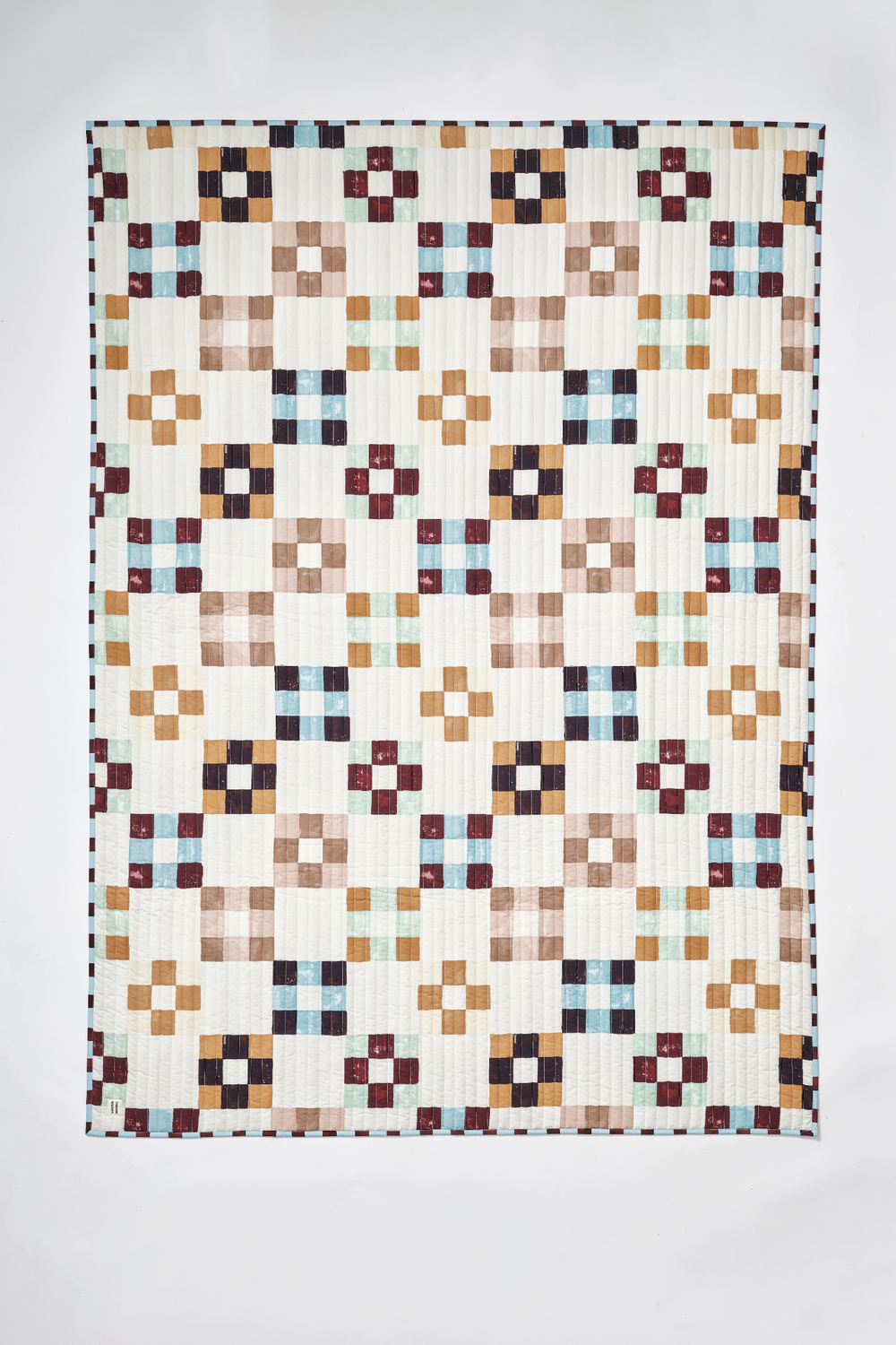 patchwork print and stripe mix quilted bedding throw