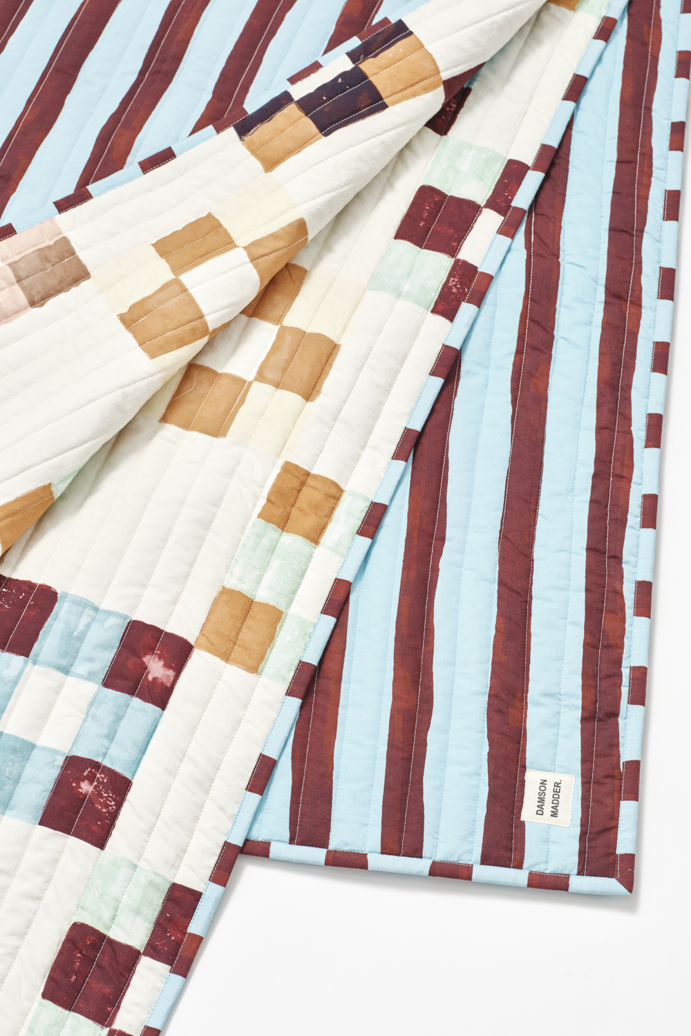patchwork print and stripe mix quilted bedding throw