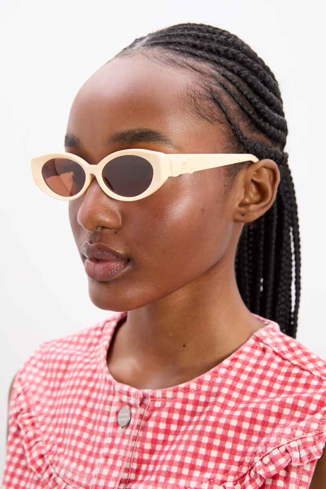 Catty Oval Sunglasses With Bow Detail In Bone