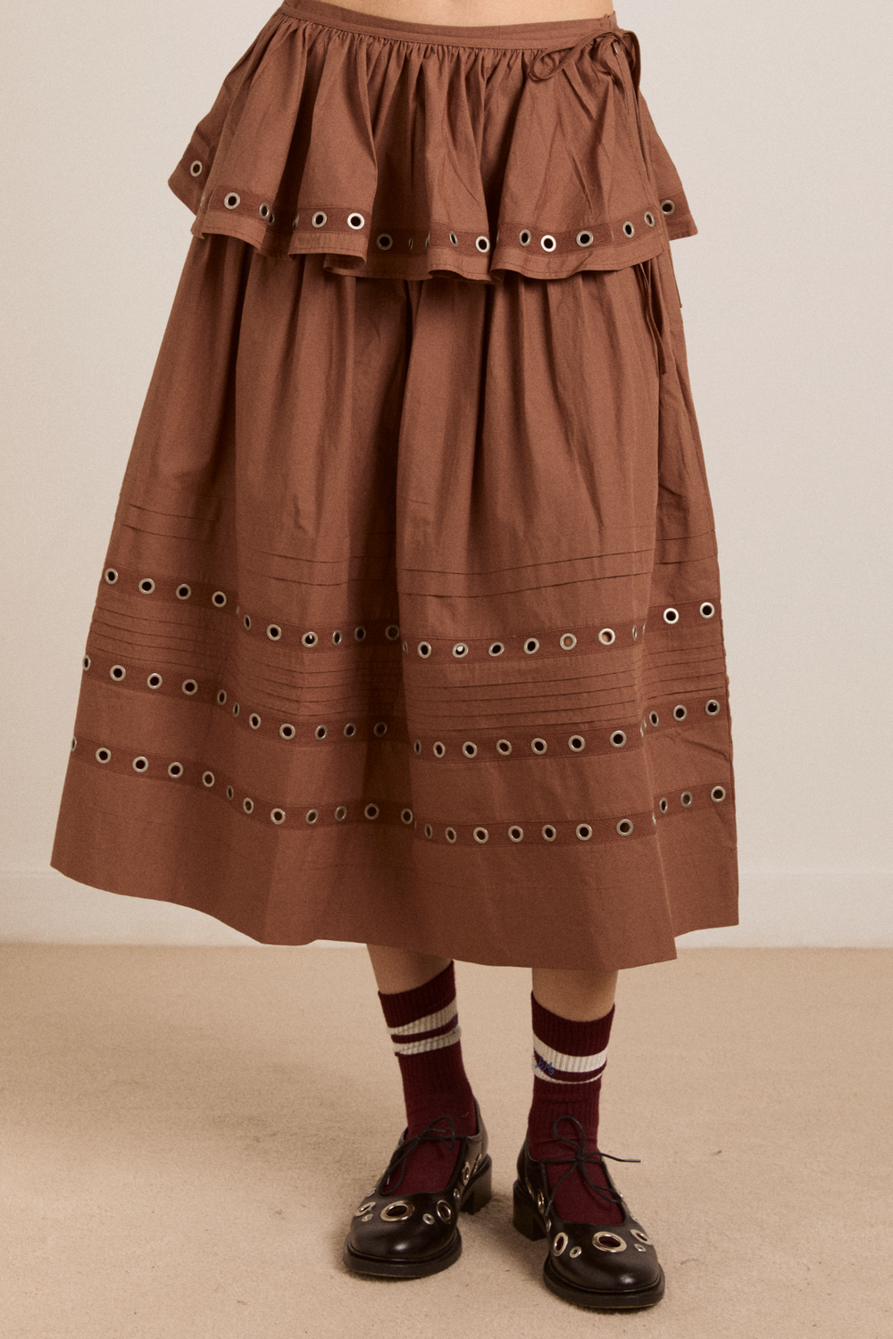 anika eyelet skirt with ruffle belt- tan