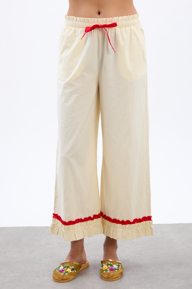 tula frilly hem trouser - butter/red