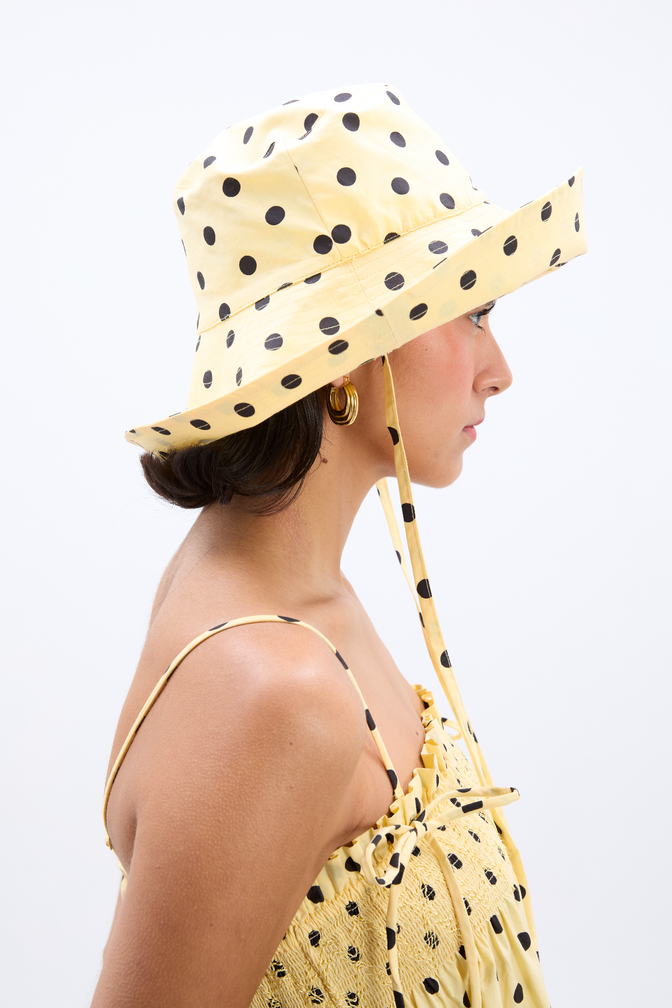 sunhat in butter yellow & black polka dot