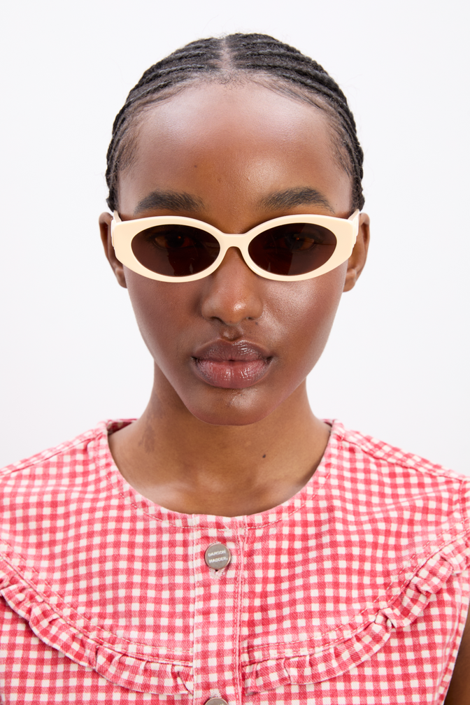 Catty Oval Sunglasses With Bow Detail In Bone
