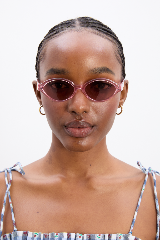 Slim Oval Sunglasses With Wavy Temple In Pink