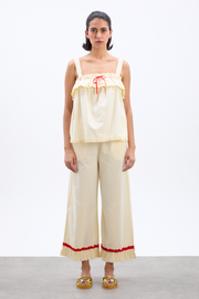 tula frilly hem trouser - butter/red